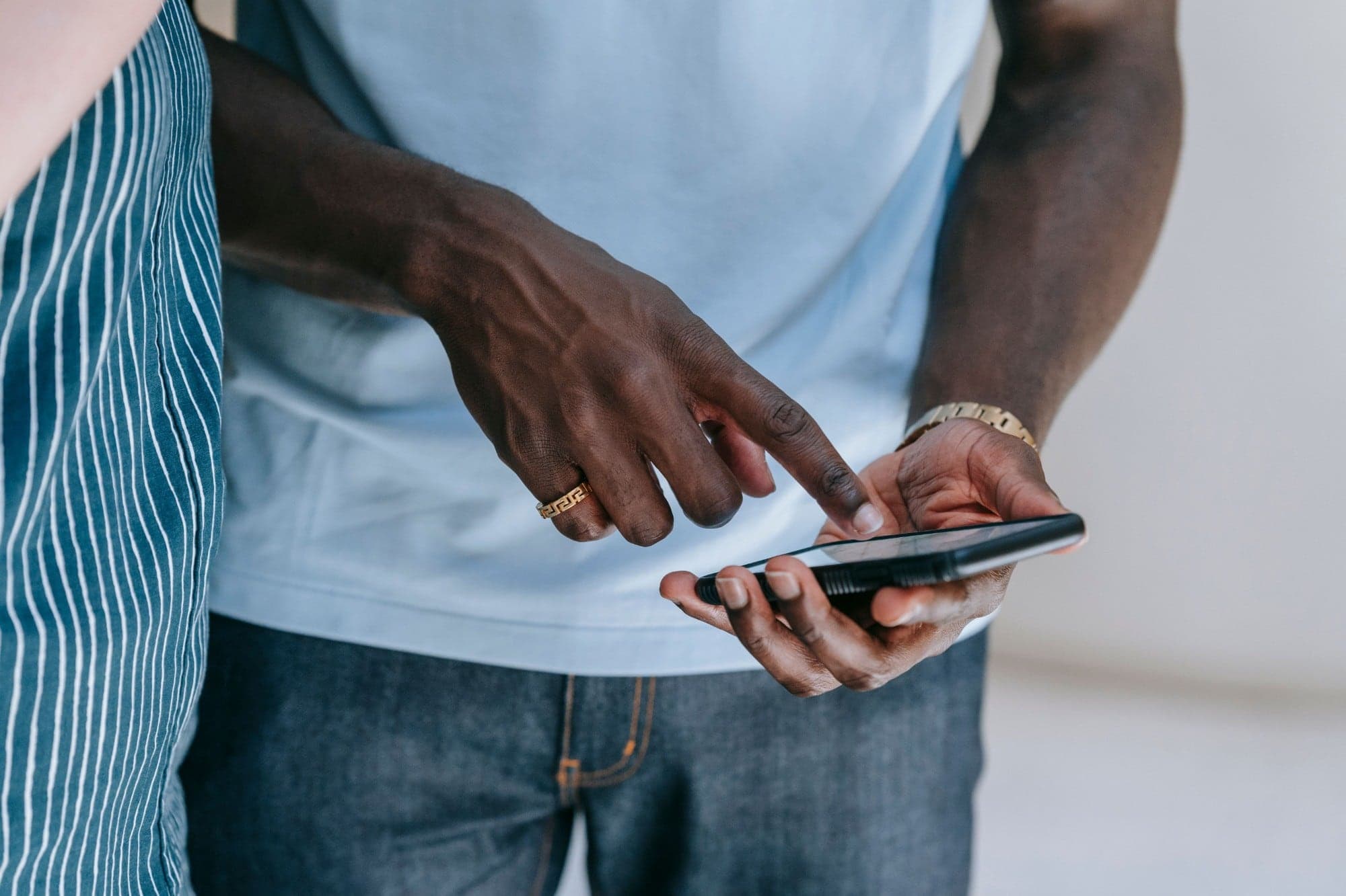 Two people looking at a phone together