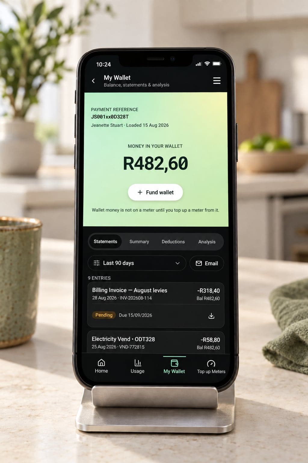 The Unimet wallet and statements on a phone on a stand