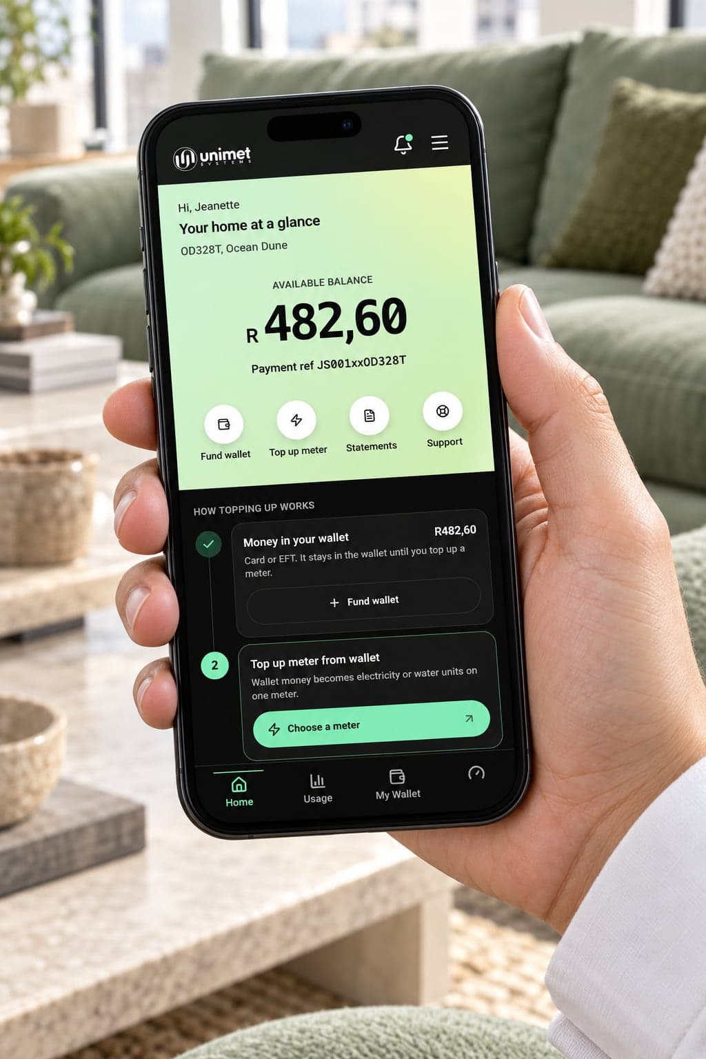 The Unimet wallet balance in a resident's hand
