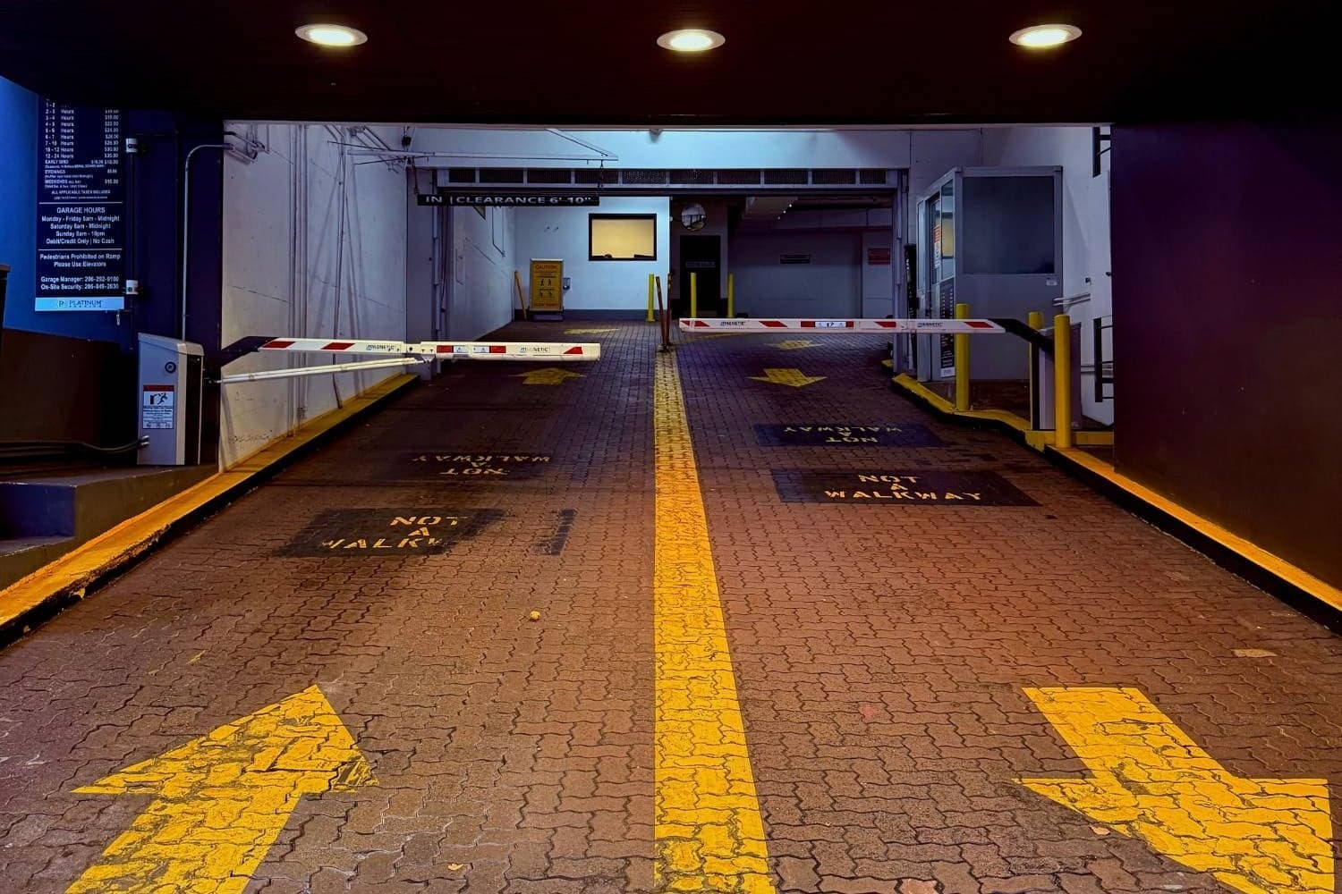 A boom gate at a parking entrance